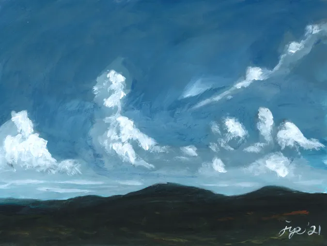 Clouds Over Green Landscape
